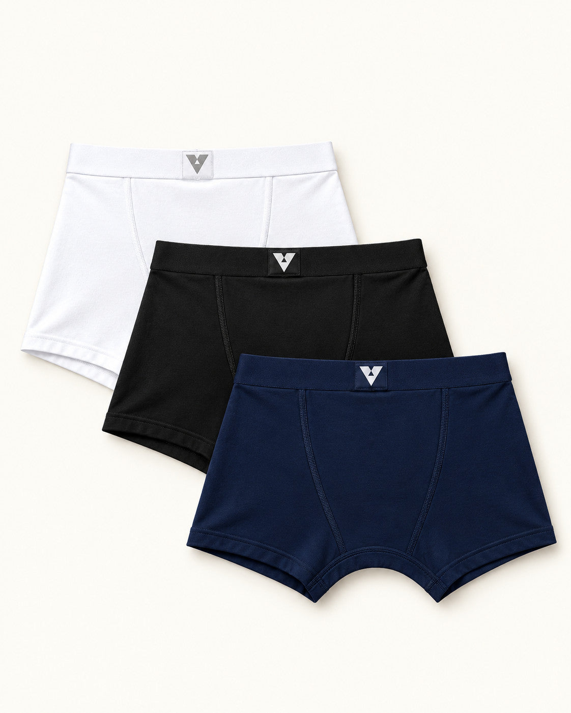 CotCloud men's cotton trunks, Black + White + Blue 3-Pack — flat lay, back view